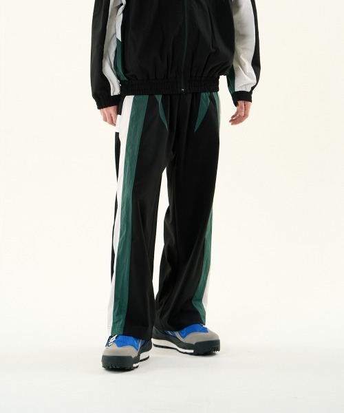 DISCOVERED（ディスカバード）の「TRACK SUITS TRACK PANTS（その他パンツ・メンズ・ブラック×グリーン/グレー・SMALL/LARGE）」の3枚目の写真