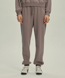 IBA NENETS（イバネネツ）の「Eye Logo Steady Sweatpants-Brown（スウェットパンツ）」