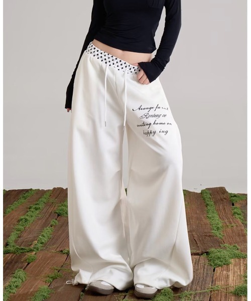 SHEENA（シーナ）の「【裾ドローコード付き】ドットウエスト刺繍ロゴスウェットワイドパンツ（スウェットパンツ・レディース・ネイビー/ホワイト・M）」の13枚目の写真