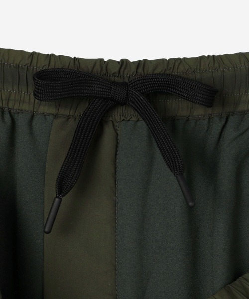 GYMPHLEX（ジムフレックス）の「1906 Gymphlex SPORT WEAR | 2WAYストレッチタフタ 中綿イージーパンツ MEN（その他パンツ・メンズ・ブラック/オリーブ・LARGE/MEDIUM）」の11枚目の写真