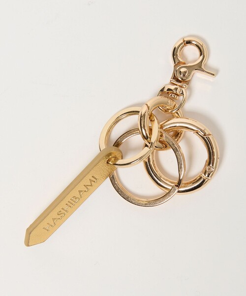 HASHIBAMI（ハシバミ）の「【別注】＜Hashibami＞フラワーモチーフ ハンドストラップ/スマホストラップ（スマホグッズ・レディース・ベージュ/その他1/ブラック・FREE）」の4枚目の写真