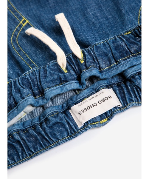 BOBO CHOSES(ボボショーズ)の「Taxi Saurus Tag denim pants(デニムパンツ・キッズ・ダークブルー・100cm/110cm/120cm)」の4枚目の写真