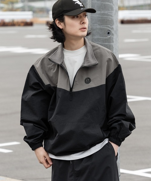 kutir（クティール）の「裾絞り配色ナイロンハーフジップ（ナイロン