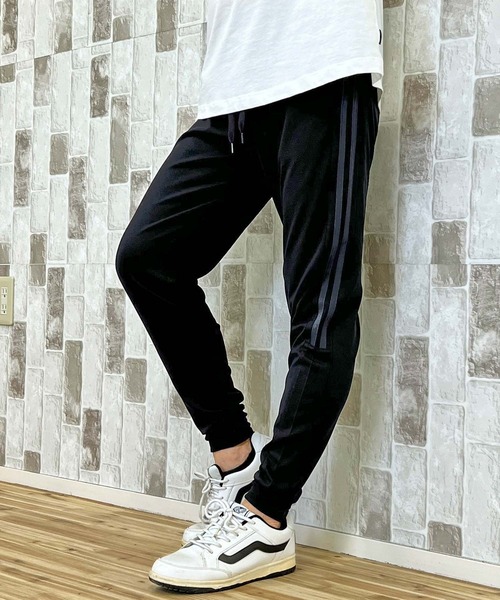 TopIsm(トップイズム)の「無地ライン入り ジャージ素材 ジョガーパンツ(スウェットパンツ・メンズ・ブラック系4/ブラック系3/ブラック系2/ブラック系1/ブラック/ブラック系6/ブラック系5・LL/L/M)」の19枚目の写真