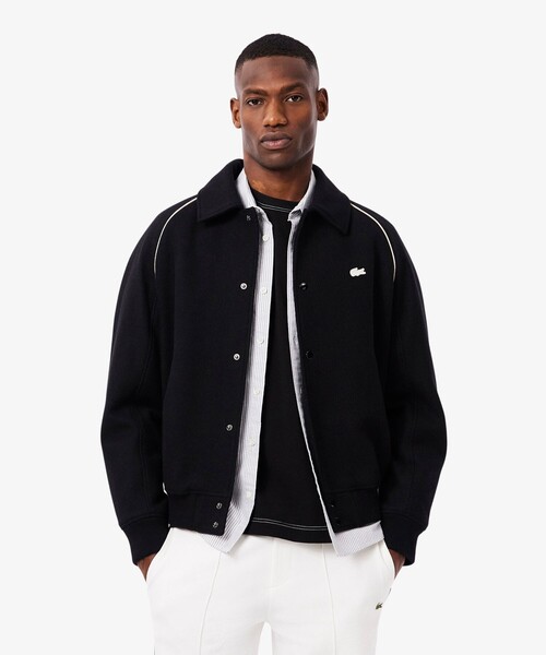 LACOSTE(ラコステ)の「キルティング中綿 バッジアクセントウールバーシティジャケット(ブルゾン・メンズ・ブラック・50/52/46/48)」の1枚目の写真