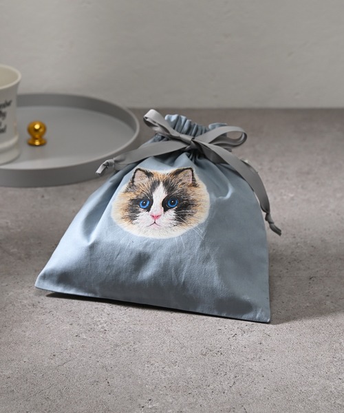 Monocoro toppi（モノコロトッピ）の「ねこ プリント 巾着 バッグ（ハンドバッグ・レディース・ブルー/パープル/アイボリー/オレンジ・フリー）」の12枚目の写真