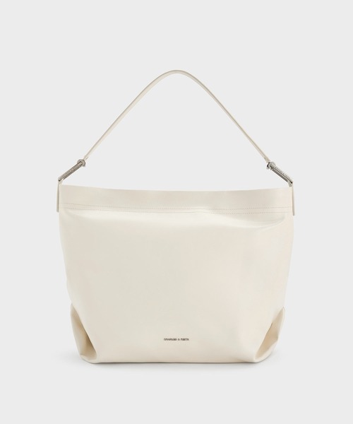 CHARLES & KEITH（チャールズ & キース）の「Sianna シアンナ スローチーホーボーバッグ（ショルダーバッグ・レディース・クリーム/ブラック・L）」の2枚目の写真