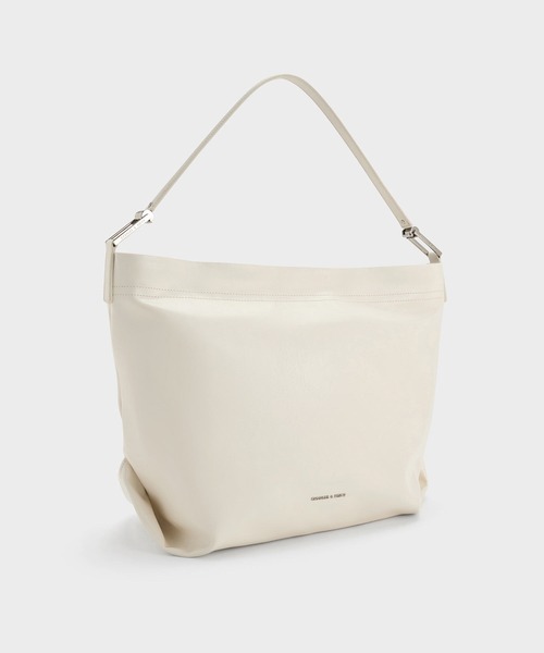 CHARLES & KEITH（チャールズ & キース）の「Sianna シアンナ スローチーホーボーバッグ（ショルダーバッグ・レディース・クリーム/ブラック・L）」の16枚目の写真
