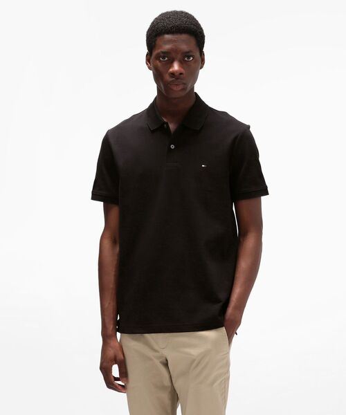 TOMMY HILFIGER(トミーヒルフィガー)の「レギュラーポロシャツ(ポロシャツ・メンズ・ブラック/ホワイト/ネイビー・LARGE/SMALL/X-LARGE/MEDIUM)」の1枚目の写真