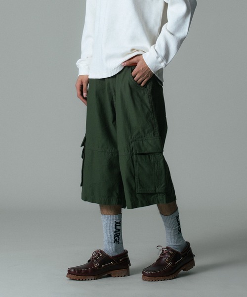XLARGE(エクストララージ)の「CARGO SHORT PANTS(カーゴパンツ・メンズ・オリーブ/カモフラージュ/ブラック・34inch/36inch/32inch/30inch)」の1枚目の写真