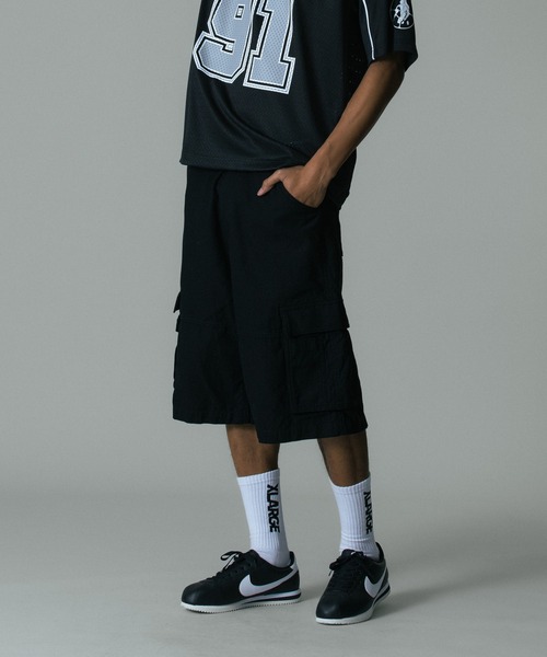 XLARGE(エクストララージ)の「CARGO SHORT PANTS(カーゴパンツ・メンズ・オリーブ/カモフラージュ/ブラック・34inch/36inch/32inch/30inch)」の2枚目の写真