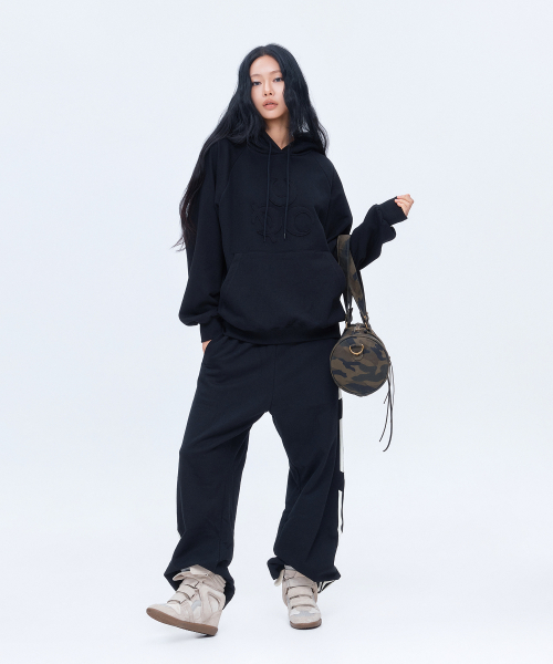 DAUSPICE(ディーオスピス)の「(DUC) Symbol フーディー ブラック(パーカー・レディース・ブラック・MEDIUM/LARGE)」の2枚目の写真