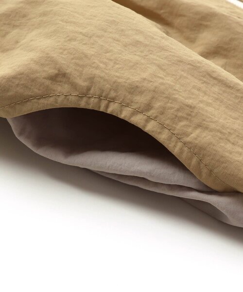 apres les cours（アプレレクール）の「バイカラーウィンドブレーカー（ナイロンジャケット・キッズ・ブラウン/マスタード・120/140/90/130/100/110/80）」の5枚目の写真