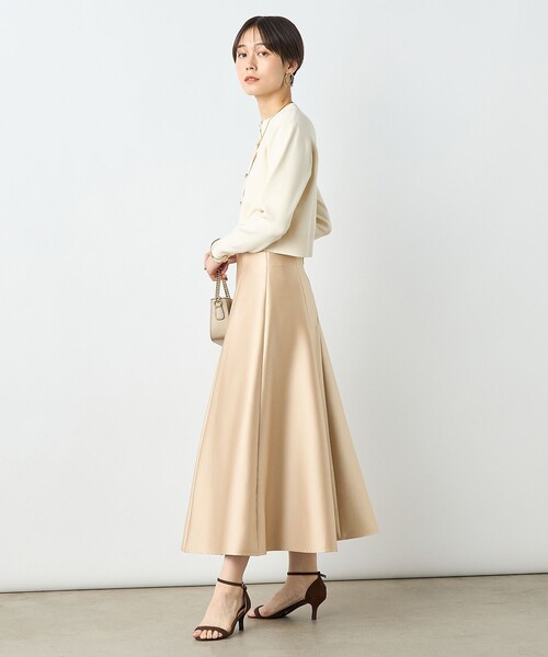 NOLLEY’S Sophi(ノーリーズソフィ)の「スムース編みショート丈カーディガン(カーディガン/ボレロ・レディース・アイボリー/サックスブルー/ブラック・38)」の6枚目の写真