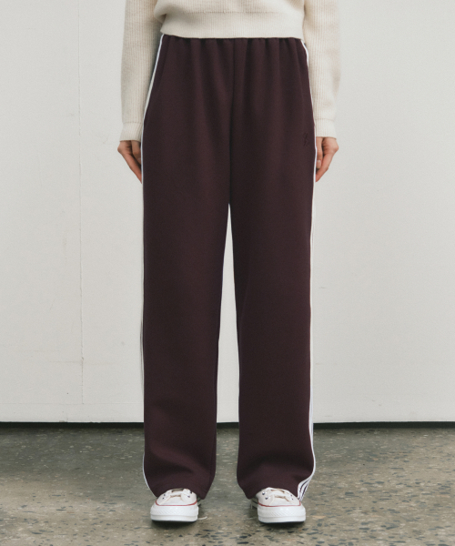 WEDNESDAYOASISFORWOMEN（ウェンズデー オアシス フォー ウーマン）の「W/ニュートロライントラックパンツ_ダークパープル(W25-PT25)（スウェットパンツ・レディース・パープル・MEDIUM/LARGE）」の2枚目の写真