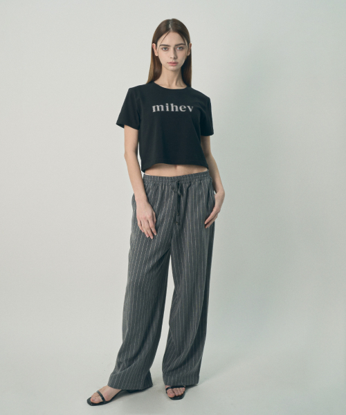 MIHEV(ミヘブ)の「ミヘブ グラフィックロゴ クロップTシャツ ブラック(Tシャツ/カットソー・レディース・その他・MEDIUM/LARGE)」の3枚目の写真