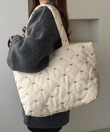 kutir（クティール）の「kutirlune／リボン柄キルティングバッグ（トートバッグ）」