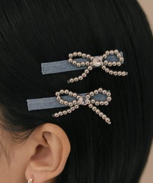 vacanza（ヴァカンザ）の「vacanza 銀色パール付きリボン・ヘアクリップ2個セット（バレッタ/ヘアクリップ）」