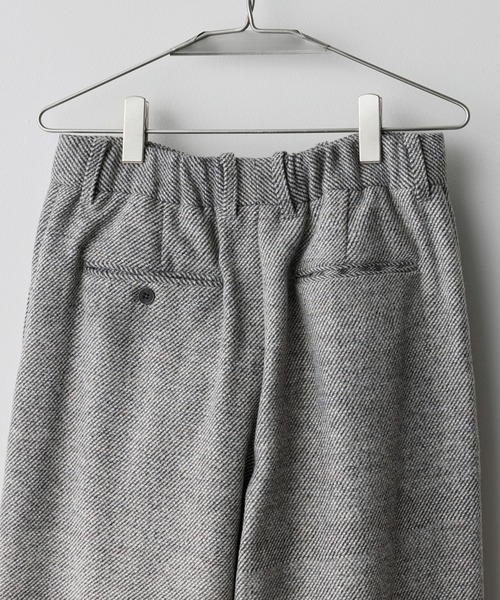 WYM LIDNM（ウィム バイ リドム）の「CROSS TUCK ARCH TWEED BAGGY