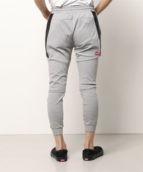 LUXE/R（ラグジュ）の「【ユニセックス】【LUXE/R】防水 ファスナー デザイン イージー ジョガーパンツ(RMS)（スウェットパンツ・メンズ・ブラック/杢グレー・MEDIUM/X-LARGE/LARGE）」の4枚目の写真