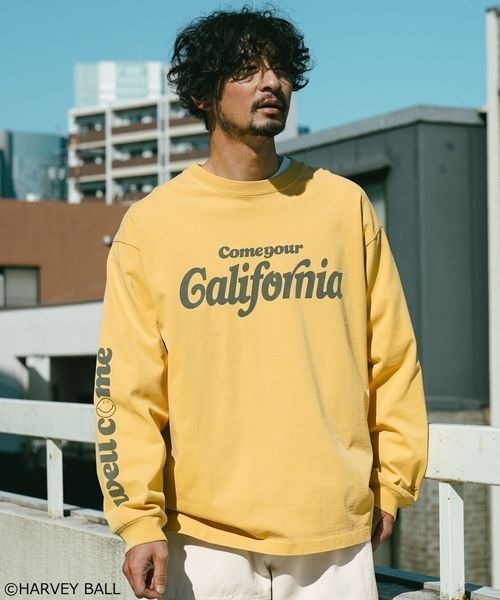 BAYFLOW(ベイフロー)の「【SMILEY FACE(スマイリーフェイス)】HELLO SMILEY長袖プリントTシャツ(Tシャツ/カットソー・メンズ・ホワイト系/チャコール/オフホワイト/イエロー・MEDIUM/LARGE)」の1枚目の写真