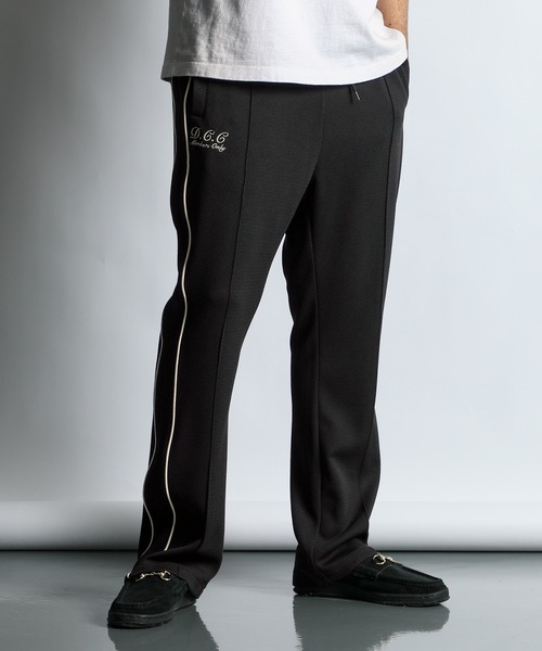 The DUFFER of ST.GEORGE（ザダファーオブセントジョージ）の「POLYESTER JERSEY SET UP TRUCK PANTS：セットアップ トラックパンツ（その他パンツ・メンズ・ブラック/ライトグレー・MEDIUM/LARGE/X-LARGE）」の2枚目の写真