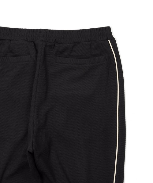 The DUFFER of ST.GEORGE（ザダファーオブセントジョージ）の「POLYESTER JERSEY SET UP TRUCK PANTS：セットアップ トラックパンツ（その他パンツ・メンズ・ブラック/ライトグレー・MEDIUM/LARGE/X-LARGE）」の5枚目の写真