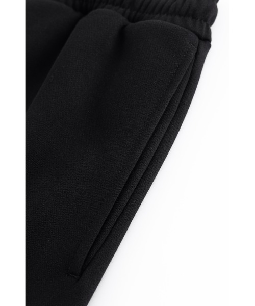UNKNOWN LONDON（アンノウン・ロンドン）の「スエットパンツ｜Black x Silver Cross Rhinestone Jogger｜Unknown London（スウェットパンツ・メンズ・ブラック・MEDIUM/LARGE/X-LARGE/SMALL）」の6枚目の写真