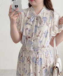 p courge（ピークルジュ）の「水彩フラワープリント ボウタイリボン フレアワンピース（ワンピース）」
