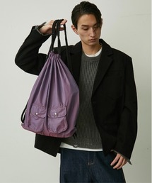 BLANK HOTEL（ブランクホテル）の「Chambray Double Pocket Drawstring Bag / シャンブレーダブルポケットナップサック（バックパック/リュック）」