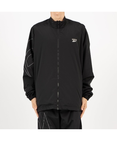 Reebok（リーボック）の「KANGHYUK ロゴ トラックジャケット / STITCHED LOGO TRACK JACKET（ナイロンジャケット・メンズ・グレー・LARGE）」の4枚目の写真