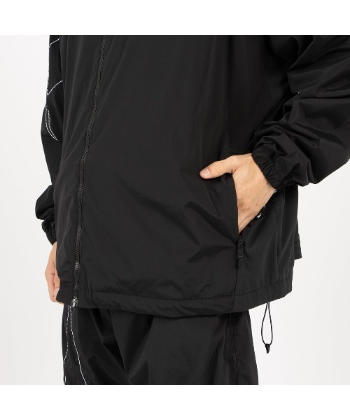 Reebok（リーボック）の「KANGHYUK ロゴ トラックジャケット / STITCHED LOGO TRACK JACKET（ナイロンジャケット・メンズ・グレー・LARGE）」の7枚目の写真