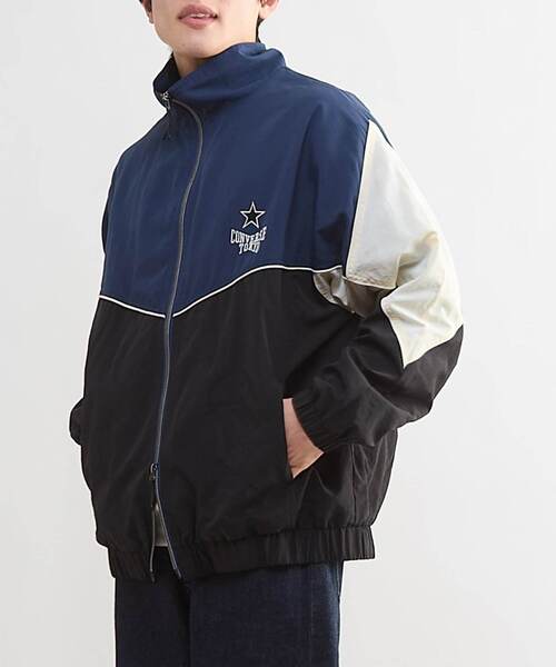 CONVERSE TOKYO(コンバーストウキョウ)の「BI-COLOR NYLON JACKET(ブルゾン・レディース・ネイビー/カーキ/グレー・SMALL/MEDIUM)」の6枚目の写真