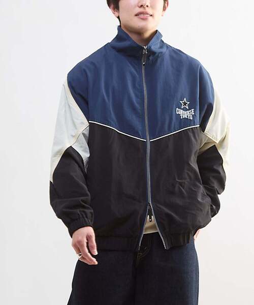 CONVERSE TOKYO(コンバーストウキョウ)の「BI-COLOR NYLON JACKET(ブルゾン・レディース・ネイビー/カーキ/グレー・SMALL/MEDIUM)」の7枚目の写真