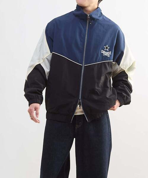 CONVERSE TOKYO(コンバーストウキョウ)の「BI-COLOR NYLON JACKET(ブルゾン・レディース・ネイビー/カーキ/グレー・SMALL/MEDIUM)」の8枚目の写真