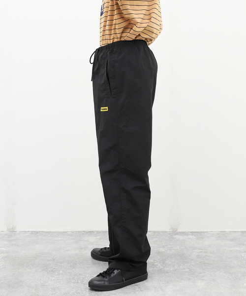 パンツ plllllleeasse nylon track pants (BLACK) PLEASURES（プレジャー）の「【PLEASURES / プレジャー】GAZE NYLON