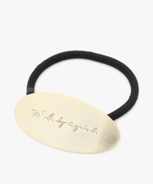 To b. by agnes b.（トゥービーバイアニエスベー）の「メタル ロゴ ヘアタイ（ヘアゴム）」