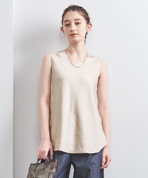 UNITED ARROWS(ユナイテッドアローズ)の「サテン ノースリーブ ブラウス(シャツ/ブラウス・レディース・ナチュラル/ネイビー・FREE)」の1枚目の写真