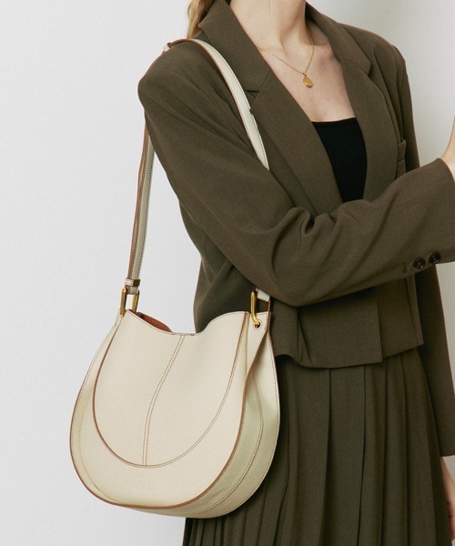 NiiNa(ニーナ)の「【NiiNa】【高品質牛革】2way ワンハンドルラウンドショルダーバッグ(インナーポーチ付き)(ショルダーバッグ・レディース・ホワイト/ブルー・FREE)」の4枚目の写真