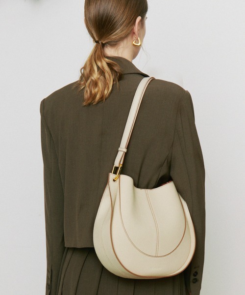 NiiNa(ニーナ)の「【NiiNa】【高品質牛革】2way ワンハンドルラウンドショルダーバッグ(インナーポーチ付き)(ショルダーバッグ・レディース・ホワイト/ブルー・FREE)」の7枚目の写真