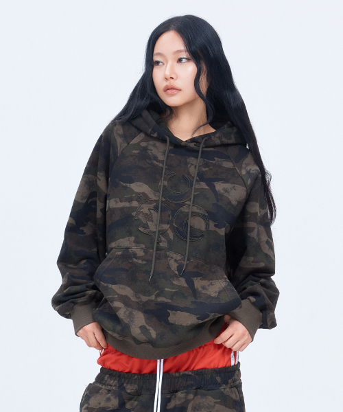DAUSPICE(ディーオスピス)の「(DUC) シンボルフーディー カモ(パーカー・レディース・ダークグリーン・MEDIUM/LARGE)」の2枚目の写真