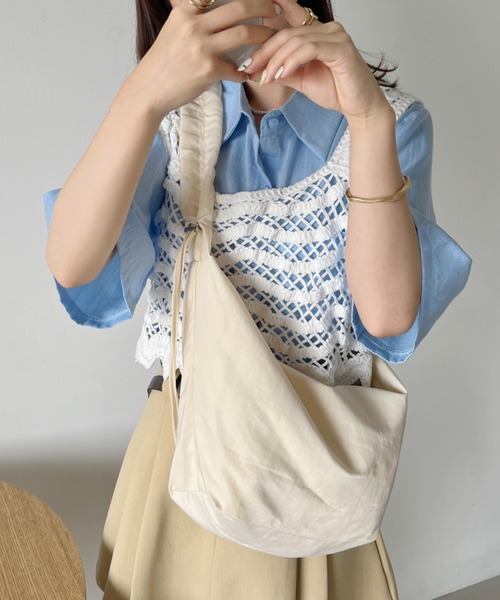 CLEA(クレア)の「クロシェ編みクロップド丈ビスチェトップス(ベスト・レディース・アイボリー/ホワイト・FREE)」の17枚目の写真