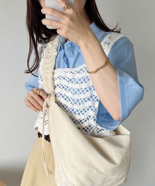 CLEA(クレア)の「クロシェ編みクロップド丈ビスチェトップス(ベスト・レディース・アイボリー/ホワイト・FREE)」の16枚目の写真