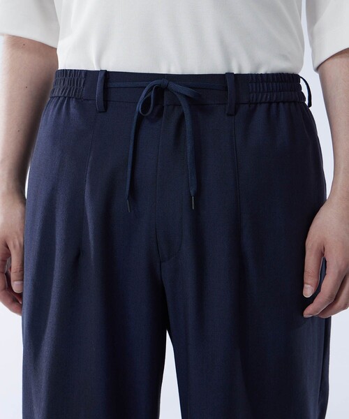 UNITED TOKYO（ユナイテッドトウキョウ）の「URBAN DYED イージーパンツ｜セットアップ着用可能（スラックス・メンズ・ネイビー/オリーブ・1/2）」の7枚目の写真