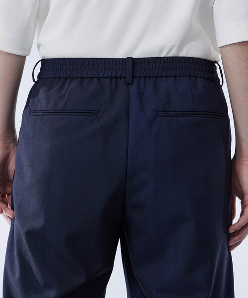 UNITED TOKYO（ユナイテッドトウキョウ）の「URBAN DYED イージーパンツ｜セットアップ着用可能（スラックス・メンズ・ネイビー/オリーブ・1/2）」の5枚目の写真