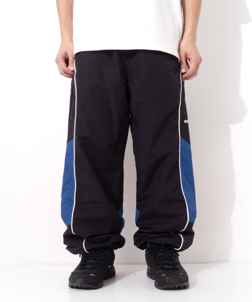 QT8 GARMENTS(キューティーエイトガーメント)の「LB Track Pants (Black/Blue)(スウェットパンツ・レディース・その他・MEDIUM/LARGE/X-LARGE)」の1枚目の写真