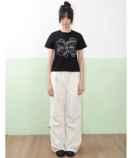 AMESWORLDWIDE(アメスワールドワイド)の「A'GEM/9 × .kom 『AMESWORLDWIDE/アメスワールドワイド』CHARACTER SPRAY TEE/キャラクタースプレイTEE(Tシャツ/カットソー・レディース・ブラック/ピンク・S)」の4枚目の写真