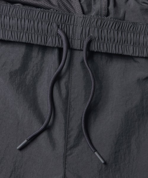 MUSINSA STANDARD（ムシンサスタンダード）の「ナイロンワイドストリングパンツ[グレー]（スウェットパンツ・メンズ・その他・26/28/30/32/34/36/38/40/42）」の10枚目の写真