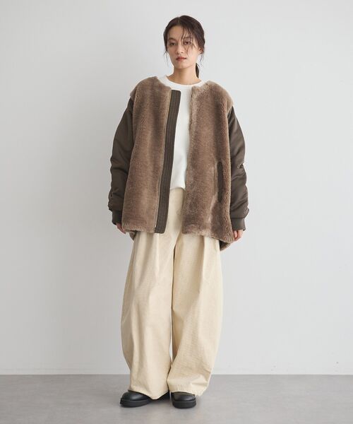 GARAGE OF GOOD CLOTHING（ガレージオブグッドクロージング）の「ヘイジーボア切り替えコート（ノーカラーコート・レディース・ブラック/モカ・FREE）」の7枚目の写真