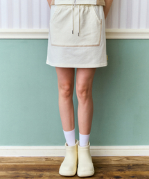PIECEMAKER（ピースメーカー）の「POCKET SWEAT MINI SKIRT (CREAM)（スカート）」